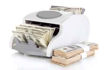 Machine for counting money and 100 dollar bills isolated