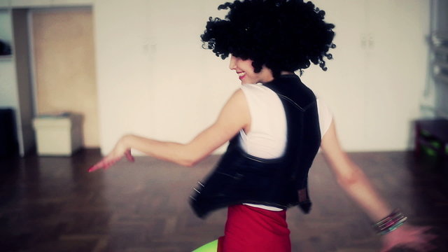 Montage of couple dancing funky dance