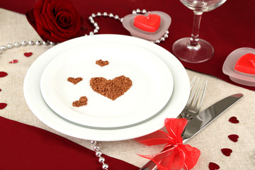 Table setting in honor of Valentine's Day close-up