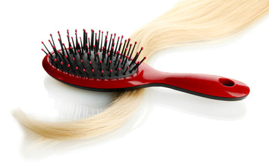 comb brush with hair, isolated on white