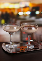 Cream cocktails on table in cafe