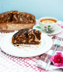 chocolate cake and tea with lemon