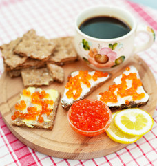 red caviar and coffee for breakfast