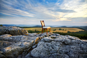 chair on top of a mountain - obrazy, fototapety, plakaty