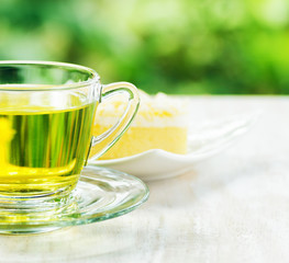 Cup of herbal tea and fresh cake