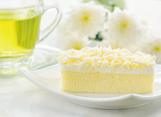 Cup of herbal tea and fresh cake