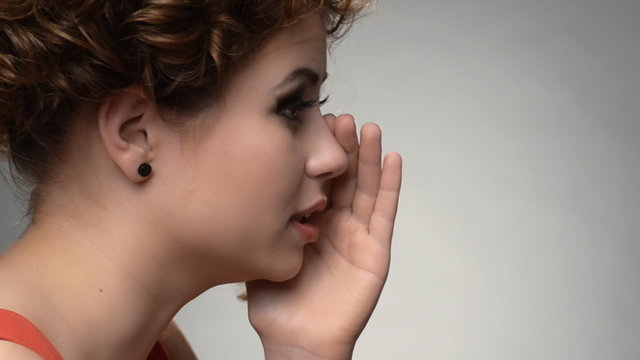 young girl whisper