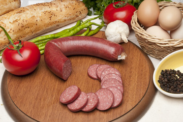 sausage on wood plate