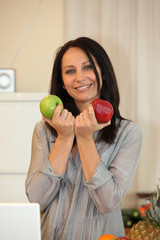 Woman holding apples