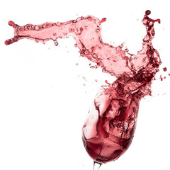 red wine splashing out of a glass, isolated on white