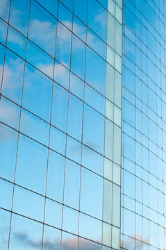 Office building and sky reflection