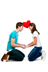 man gives a young and beautiful woman heart