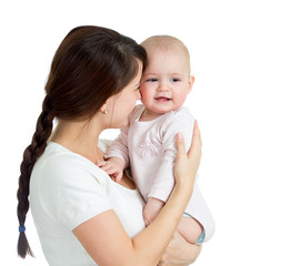 Happy mother holding her baby girl isolated