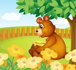 Gardinen Ein Bär sitzt in einem schönen Garten © GraphicsRF