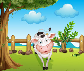 Une vache à l& 39 intérieur de la clôture