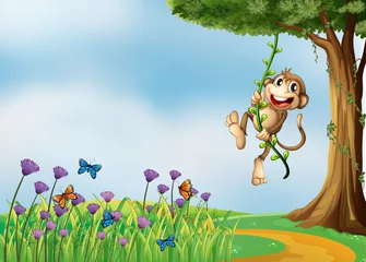 Washable wall murals Butterfly A monkey hanging on a vine plant
