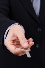 Fototapeta premium Business Woman Extends Home Key