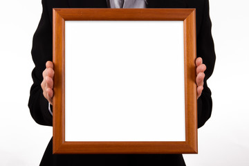 Business Woman Showing Wooden Frame