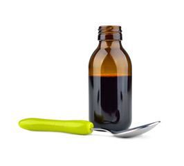 Syrup in a bottle and spoon