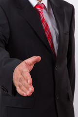 Businessman Extends Hand