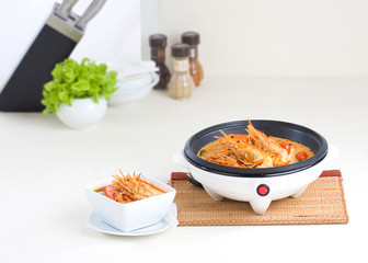 Electric pan for cooking in the kitchen interior