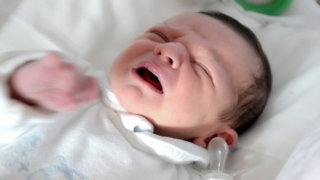 newborn baby boy crying