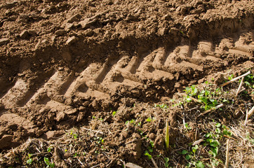tractor mark trail soil agriculture field