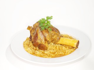 Lamb shank in juicy yellow rice