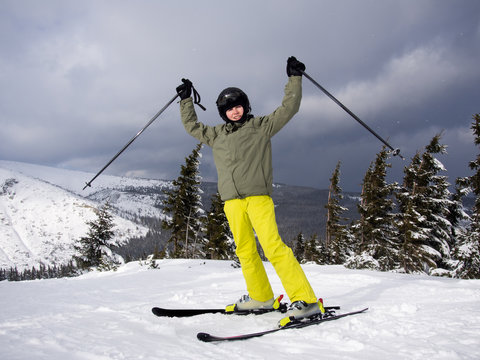 Teenage boy skiing