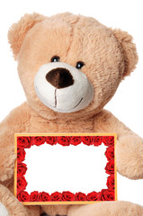 Teddy und Schild mit einem Rahmen aus Rosen