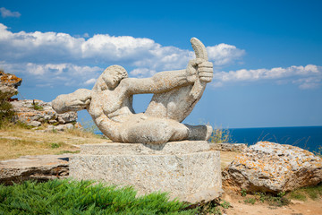Stone statue in the medieval fortress Kaliakra, Bulgaria.