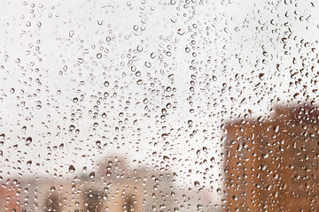 raindrops on home glass window