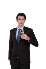 Businessman holding champagne glass