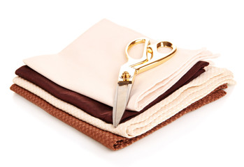 Sewing accessories and fabric isolated on white