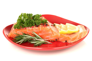 Fresh salmon fillet with herbals and lemon slices