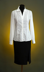 White blouse and black skirt with coat