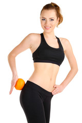 Fototapeta premium Beautiful female figure with orange isolated on white