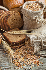 fresh bread and wheat on the wooden © vizafoto