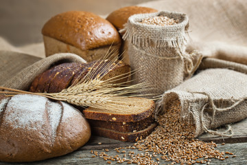 fresh bread and wheat on the wooden