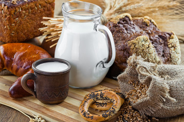 fresh bread and wheat on the wooden