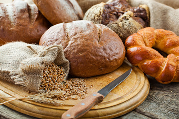 fresh bread and wheat on the wooden