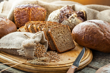 fresh bread and wheat on the wooden