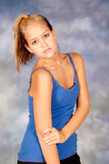 Blond woman in exercise outfit, looking at camera