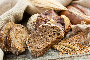 fresh bread and wheat on the wooden
