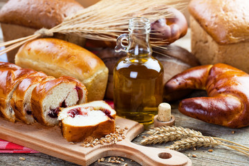 fresh bread and wheat on the wooden
