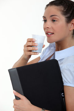 Businesswoman Grabbing Coffee On The Go