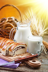 fresh bread and wheat on the wooden