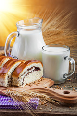 fresh bread and wheat on the wooden
