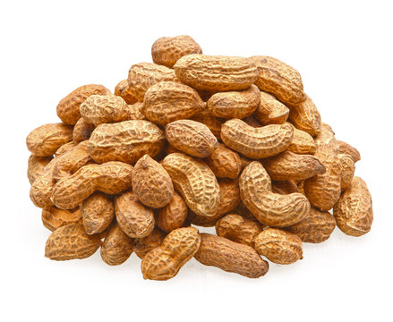 pile of peanuts in shell isolated on white