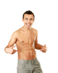 Fototapeta premium A muscular man showing his abs